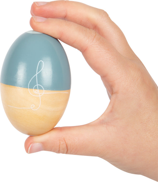 Egg hristari úr við í hendi – barnahljóðfæri fyrir tónlistarleik