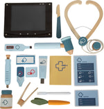 Allir fylgihlutir kanínusettsins lagðir snyrtilega upp: stethoscope, sprauta, hiti, röntgen, pincettur o.fl.