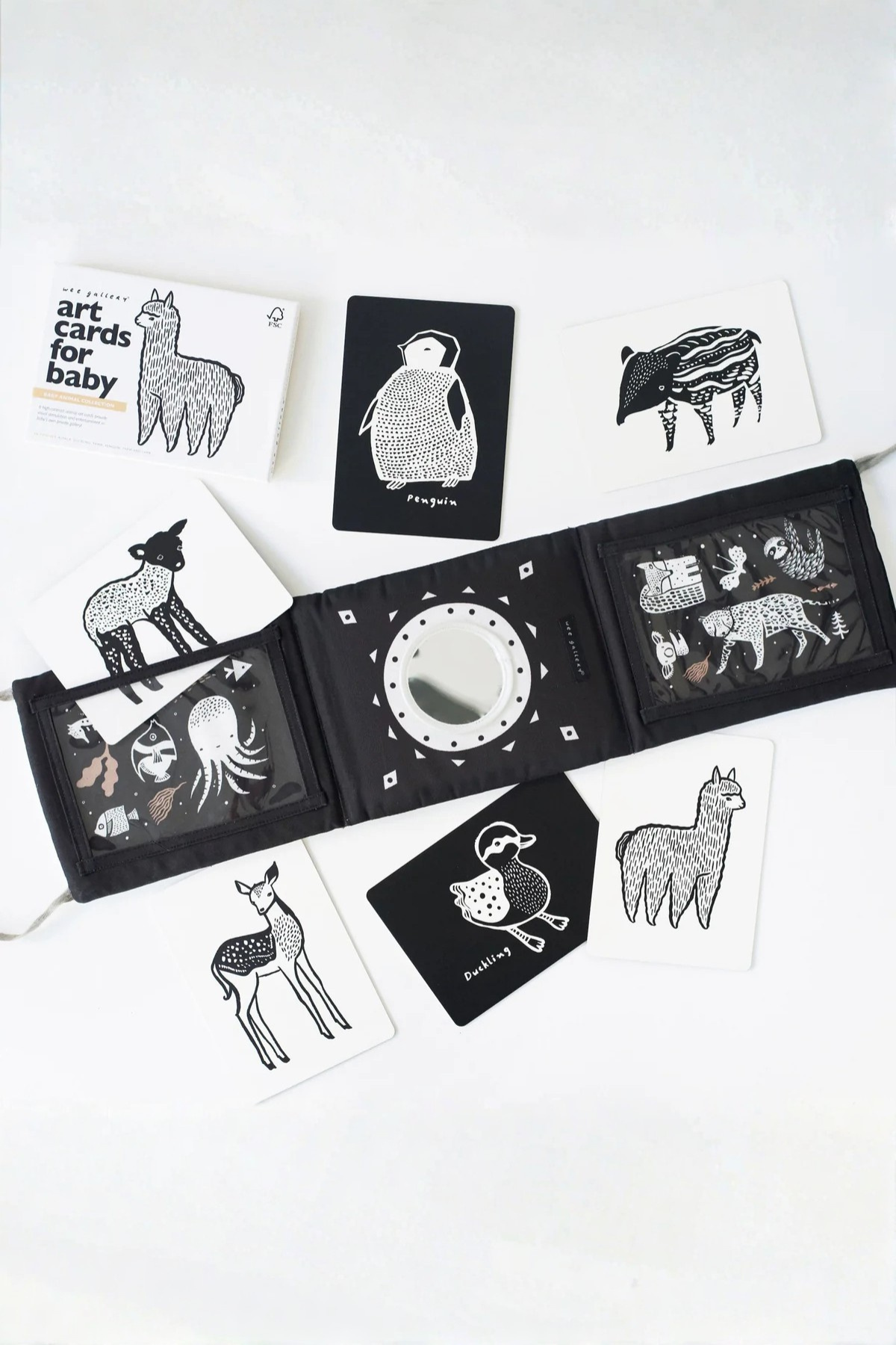 Black and white art cards for baby with animal illustrations on a white background