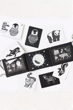 Black and white art cards with animal illustrations on a white background