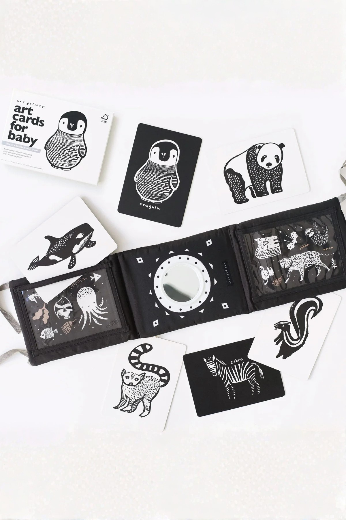 Black and white art cards with animal illustrations on a white background
