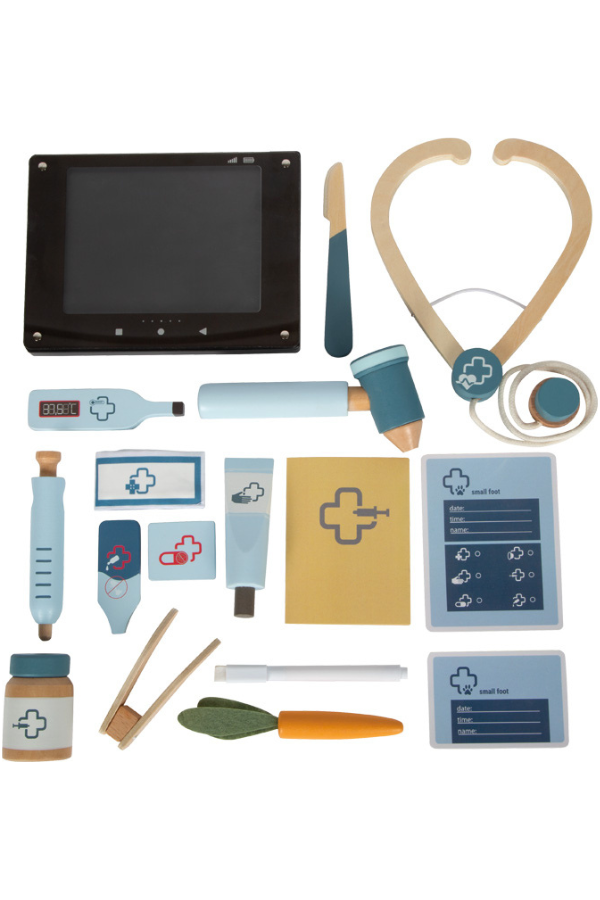 Allir fylgihlutir kanínusettsins lagðir snyrtilega upp: stethoscope, sprauta, hiti, röntgen, pincettur o.fl.