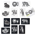 Set of black and white animal illustrations on cards with a card holder.
