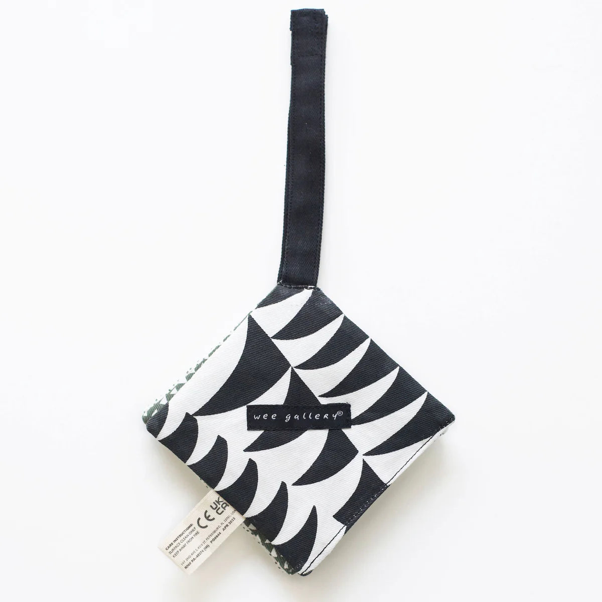 Black and white patterned pouch with a strap on a white background