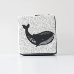 Rectangular pouch with black whale design on a white background