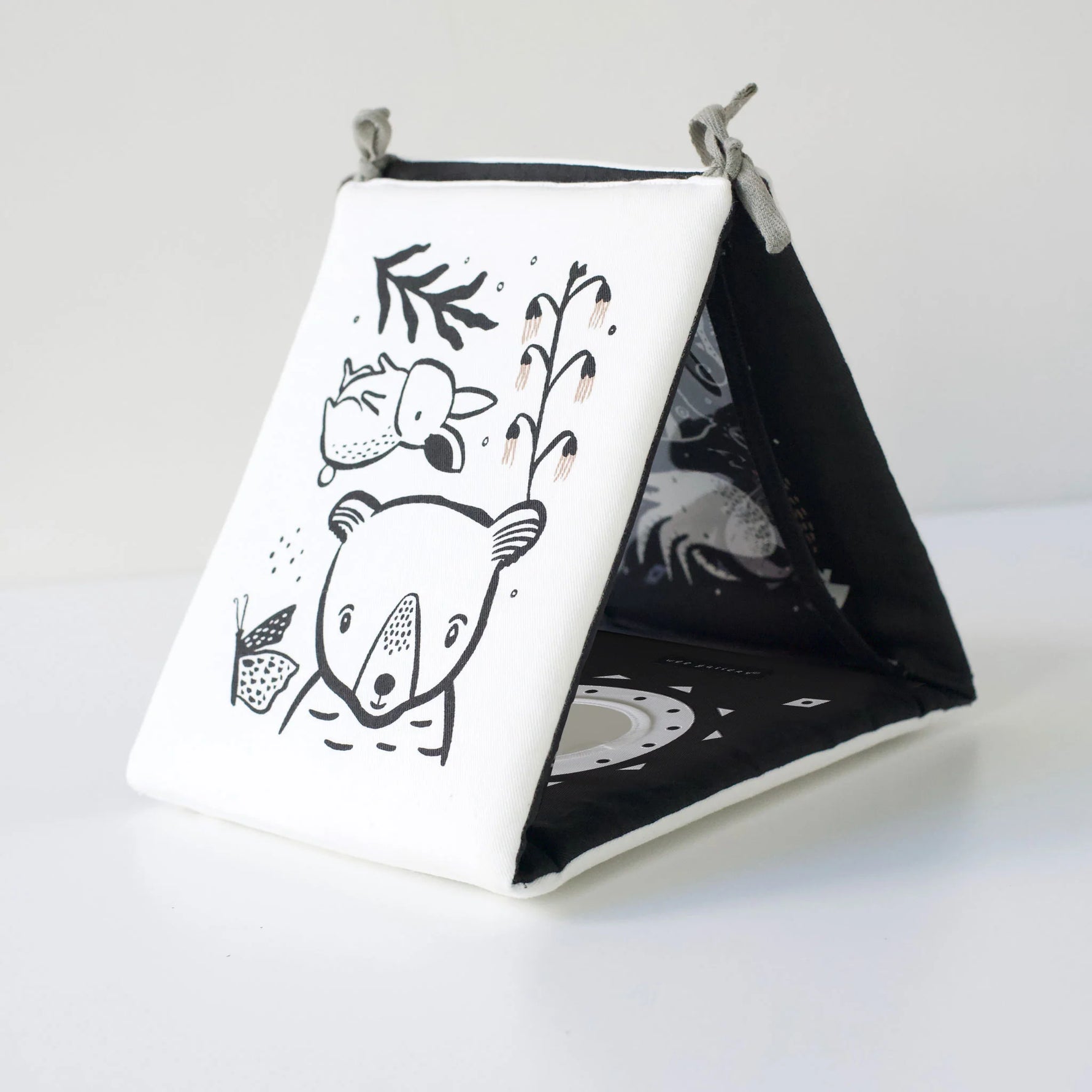 Children's Tummy Time Book with black and white illustrations on a white background