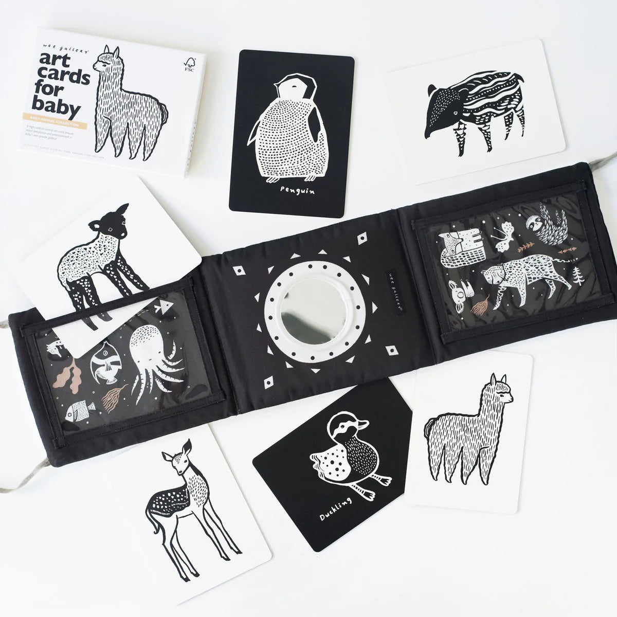 Black and white art cards for baby with animal illustrations on a white background