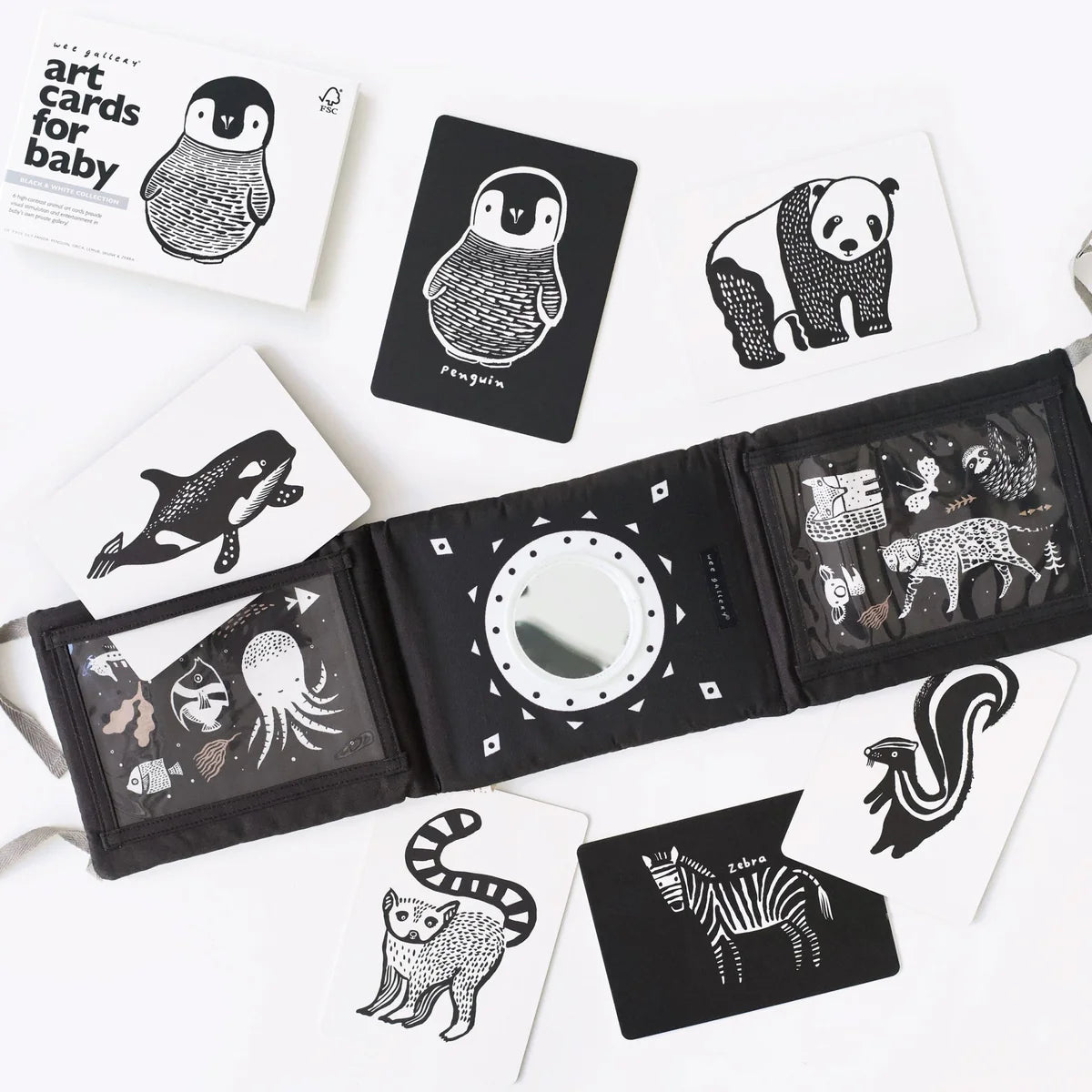 Black and white art cards with animal illustrations on a white background