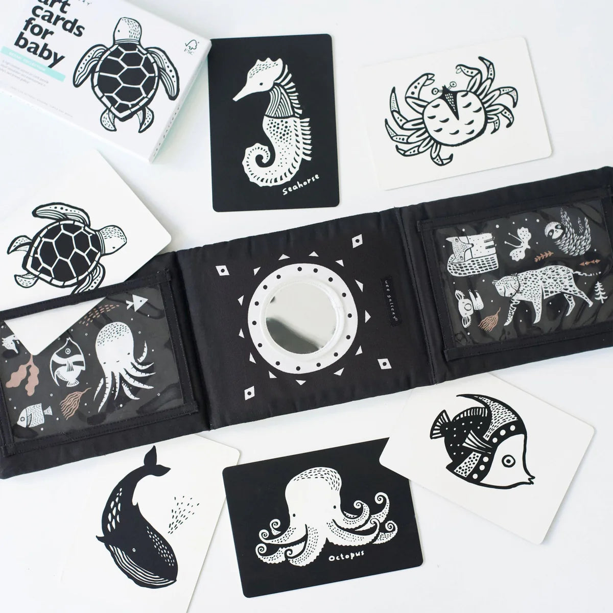 Black and white illustrated cards with animal designs on a white background